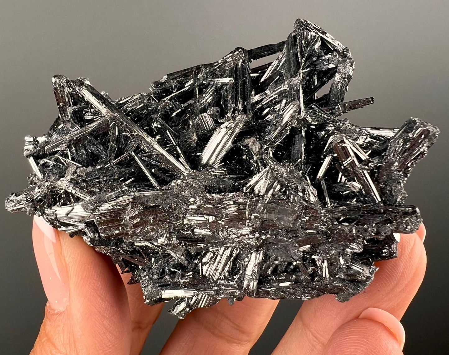 Silvery Stibnite Crystals with MirrorLike Luster