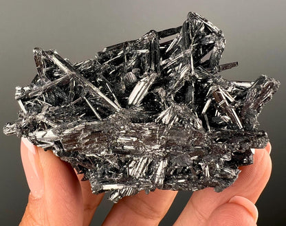 Silvery Stibnite Crystals with MirrorLike Luster