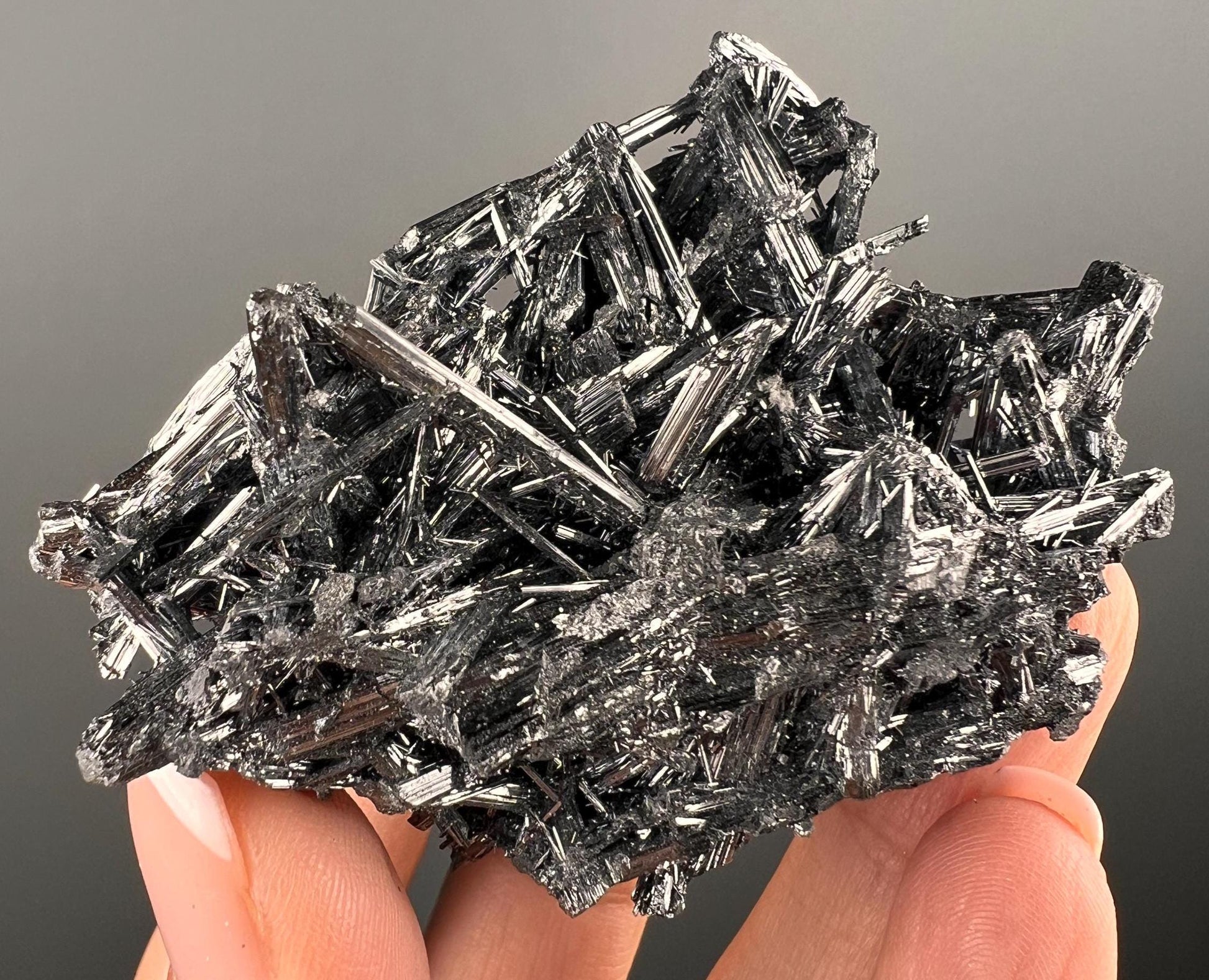 Silvery Stibnite Crystals with MirrorLike Luster