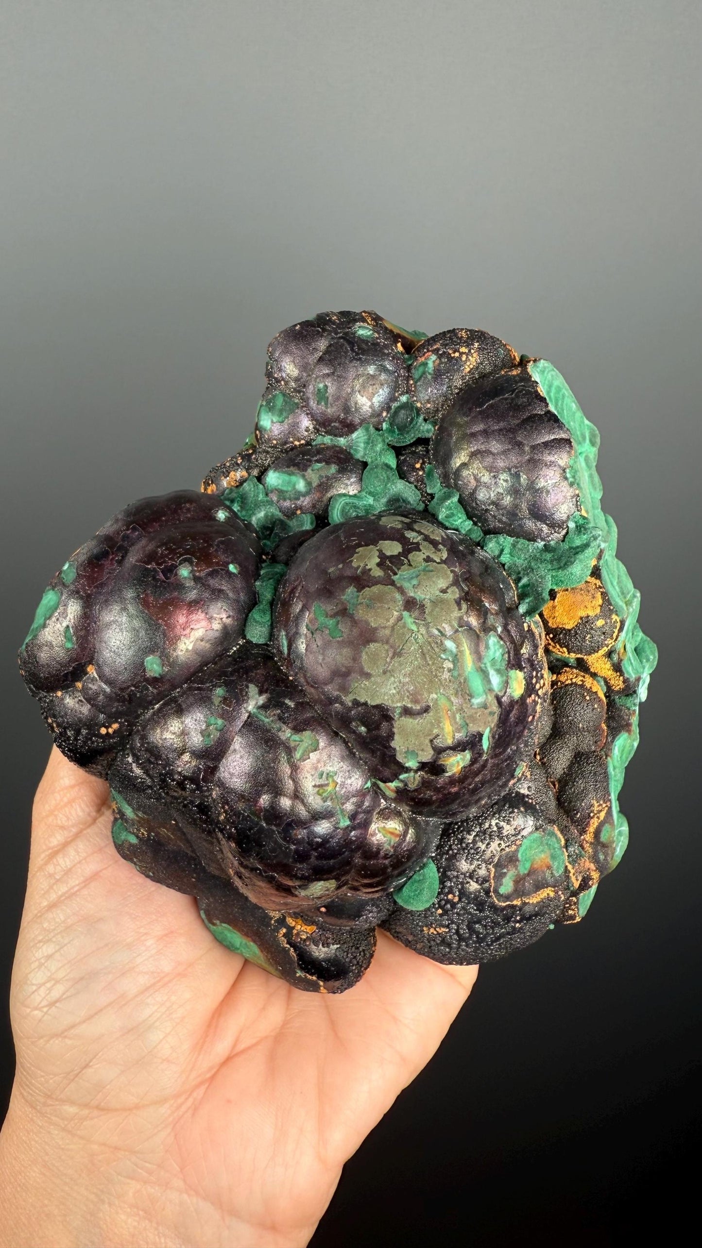 Spheroidal Clusters of Botryoidal Malachite Covered in Coppery Layer of Hematite