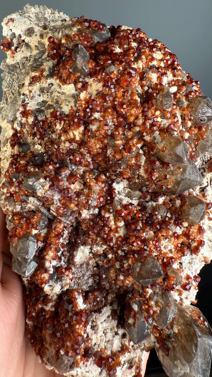 Spessartine Garnet Crystal on Smokey Quartz