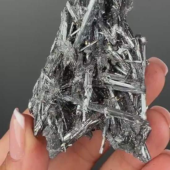 Silvery Stibnite Crystals with MirrorLike Luster