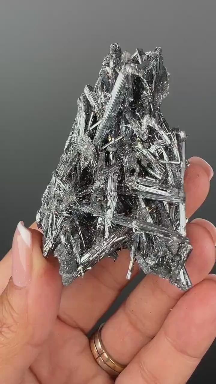 Silvery Stibnite Crystals with MirrorLike Luster